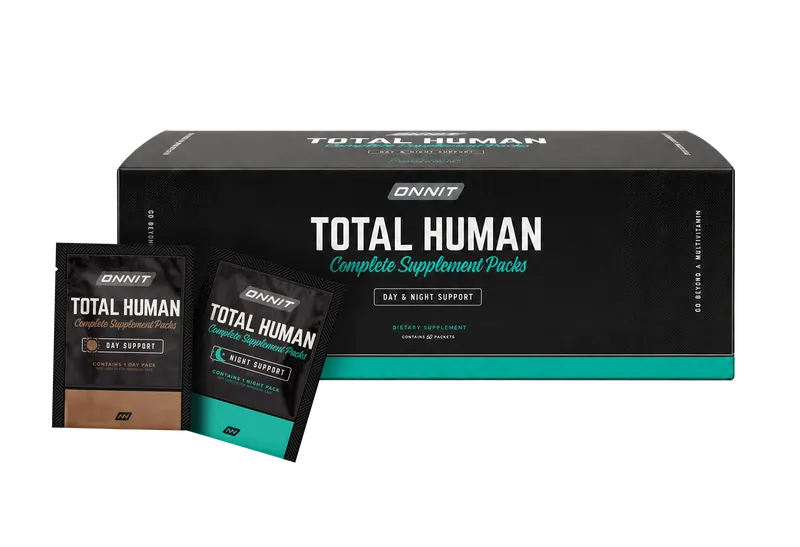 The black carton of Onnit Total Human with a day packet and a night packet in front of it